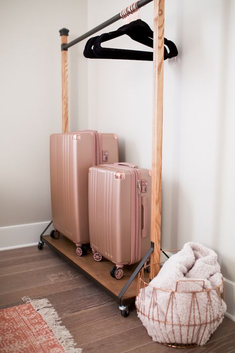 5 Tips For Hosting Overnight Guests Guest Bedroom Luggage Bench, Guest Room Luggage Rack, Suitcase Holder Guest Room, Guest Room Robes, Guest Room Luggage Rack Ideas, Guest Bedroom Cart, Guest Room Cart, Guest Room Touches, Guest Room Colorful