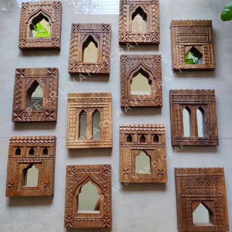 ✨Carved Aala Mirrors✨ The word " Aala '' means a cavity or shelf - etched in the walls to keep lamps. Traditionally Jharokha shaped Aala shelves were carved in the walls - on either side of the doors, to keep diyas (lamps) in them. These Aala mirrors are a wooden representation of wall Aalas , made in a variety of folk patterns of Rajasthan Size : 10x8 inches approx Material : Mango Wood Shipping : Worldwide Pls DM for orders💌 #wallaccents #distressmirrors #archmirrors #reelkarofeelk... Wooden Jharokha Decor, Rajasthani Mirror Work Wall, Calendar Design Inspiration, Hand Carved Wall Mirror, Indian Carved Wood Wall Art, Radha Krishna Wood Carving Door, Interior Design History, Courtyard Design, Reels Instagram