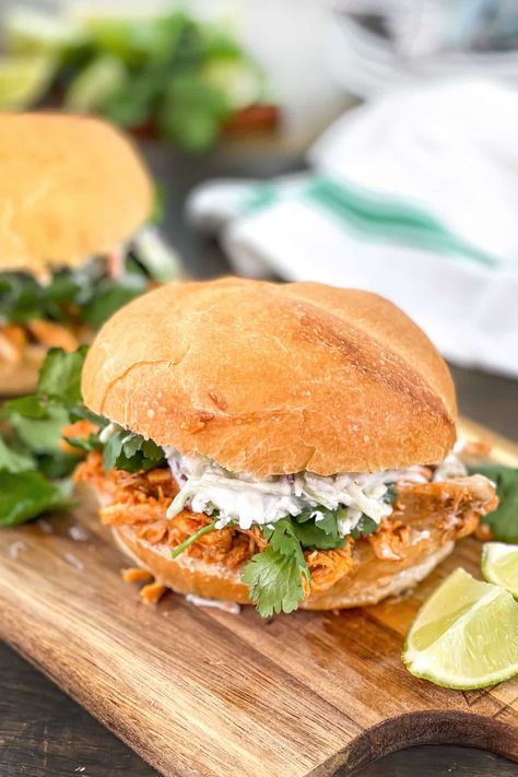 Pulled chicken sandwiches get a delicious twist with Thai curry flavors and a creamy coconut slaw. You've got to try it! via @cookthestory Coconut Slaw, Crockpot Pulled Chicken, Creamy Coconut Chicken, Pulled Chicken Sandwiches, Best Thai Food, Thai Peanut Sauce, Chicken Sandwich Recipes, Chicken Sandwiches, Thailand Food