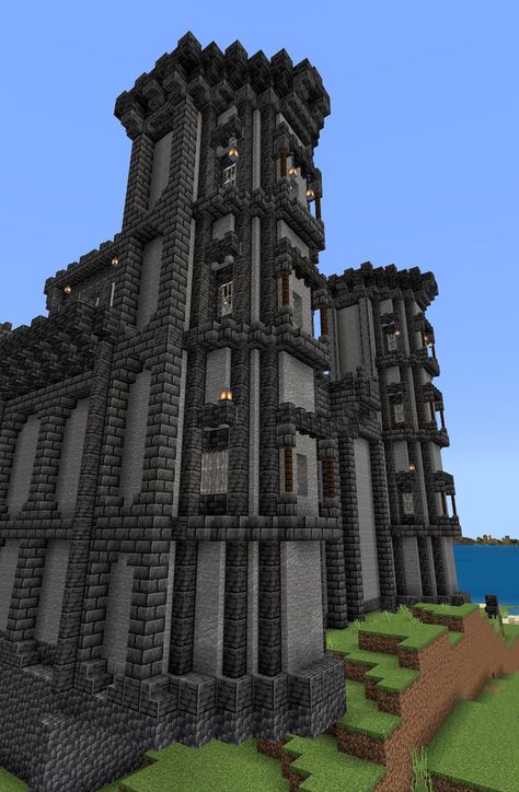 Minecraft castle or keep towers in our survival world. Minecraft Wall Tower, Minecraft Andesite House, Minecraft Building Ideas Towers, Minecraft Basalt Builds, Minecraft Keep Ideas, Blackstone Tower Minecraft, Deepslate Buildings, Dark Tower Minecraft, Deepslate Minecraft Buildings