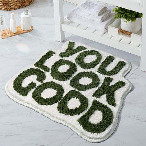 PRICES MAY VARY. Designed Cute Bath Mat: The sage green bathroom rug is printed with the letters "You look good", adding a stylish and aesthetic style element to your bathroom. The unique design can make you have a good mood every day, inject confidence and energy. We hope this cute rugs can bring you a good experience. Ultra Soft Absorbent: Made of 100% high quality polyester microfiber material, this irregular shaggy cute bath rug is ultra absorbent. Absorb moisture quickly to keep your floor Emerald Green And Gold Bathroom Decor, Dark Olive Bathroom, Kelly Green Bathroom, Green Mood Board Aesthetic, Pink And Green Apartment, Sage Green Bathroom Decor, Green Apartment Decor, Funky Bathroom Decor, Rug In Bathroom