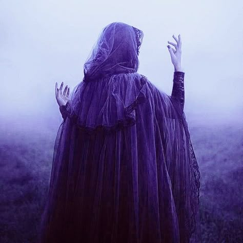 Sorcerer Aesthetic Purple, Fantasy Aesthetic Purple, Violet Witch Aesthetic, Purple Cape Aesthetic, Purple Medieval Dress Aesthetic, Purple Warlock Aesthetic, Purple Witch Hat Aesthetic, Dark Purple Magic Aesthetic, Purple Cloak Aesthetic