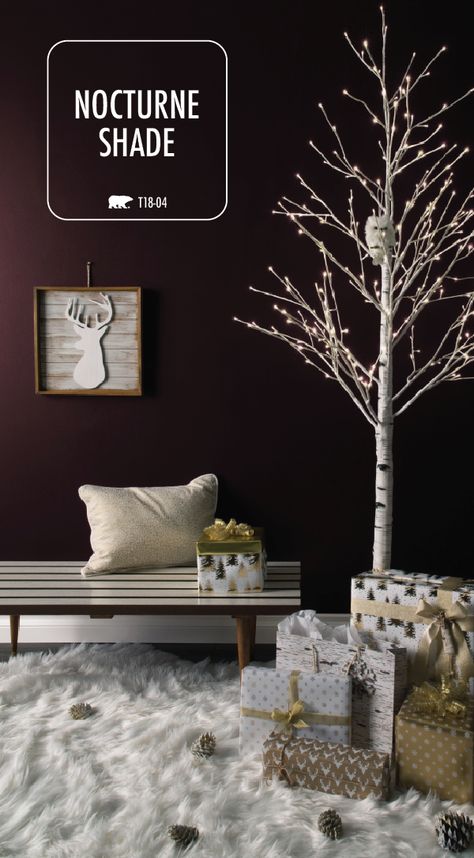 This holiday season, try something new with your home decorations. A fresh coat of paint is an easy way to give your home a DIY makeover. Find inspiration in the BEHR Paint Color of the Month: Nocturne Shade. This rich purple hue shines when paired with bright white and gold accents. Use a lighted birch tree and a fur rug to create this modern style. Behr Deep Purple Paint Colors, Nocturne Shade Color Palette, Nocturne Shade Behr, Deep Paint Colors, Nocturne Shade, Eggplant Paint Color, Bedroom White Gold, Bedroom Lighting Modern, Purple Paint Colors