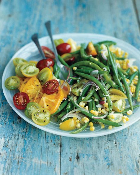 The vibrant colors of this green bean, corn, and tomato salad come from an artful blend of late-summer vegetables. Corn And Tomato Salad, Corn Tomato Salad, Corn And Tomato, Garden Veggies, Chopped Salad, Bean Salad, Tomato Salad, Green Bean, Tomato Recipes