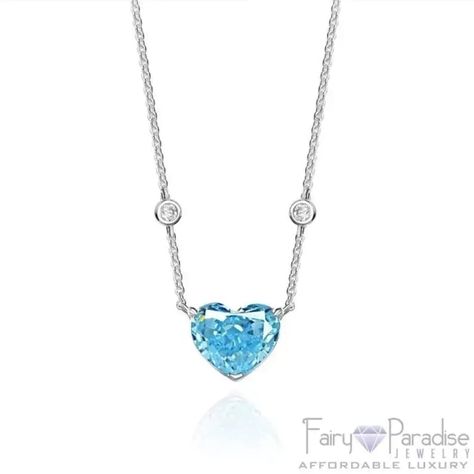 Close up photo of a silver necklace with a large azure blue heart shaped pendant made of man-made topaz. Flower And Geometric, Blue Heart Necklace, Necklace Blue Stone, Jewelry Everyday, March Birthday Gifts, Heart Shaped Pendant, Cocktail Jewelry, For Wedding Dresses, Engagement Ring Shapes