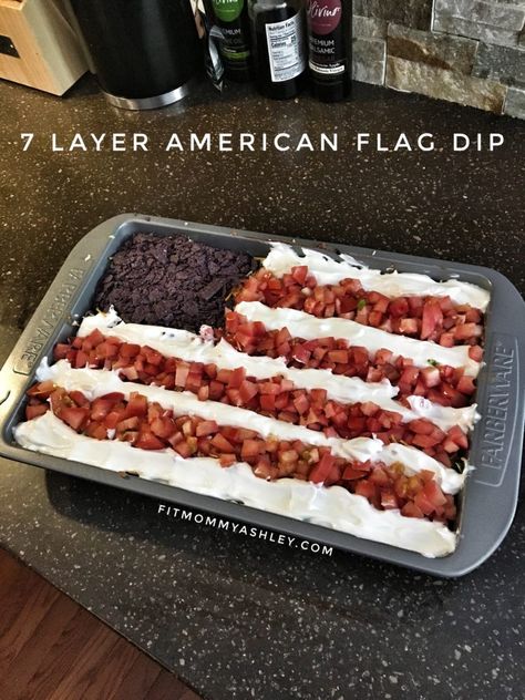 Every patriotic summer barbeque calls for a seven layer dip!  And this is one of our favorites! Super simple.  Healthier alternative than most.  And great for dipping chips or veggies too!   Ingredients:  1 tub plain Greek yogurt 2 cans refried beans (I used organic vegetarian) 1 16oz jar of salsa Shredded romaine lettuce Black olives, sliced Roma tomatoes, finely diced Taco flavored shredded cheese Blue corn tortilla chips Directions:  In a 13×9 baking dish, spread refried beans evenly across Flag Dip, July Appetizers, Blue Corn Chips, Layered Taco, Patriotic Recipes, Healthy Bbq, Patriotic Cookies, Summer Barbeque, Seven Layer Dip