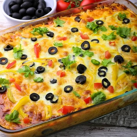 Indulge in the rich flavors of this delicious enchilada pie. Layered with seasoned ground beef, gooey cheese, and tangy enchilada sauce… Enchilada Pie Casserole, Enchilada Pie Recipe Ground Beef, Enchilada Pie Recipe, Enchilada Pie, Ground Beef Enchiladas, Flaked Salmon, Chili Relleno, Classic Potato Salad, Mexican Meals