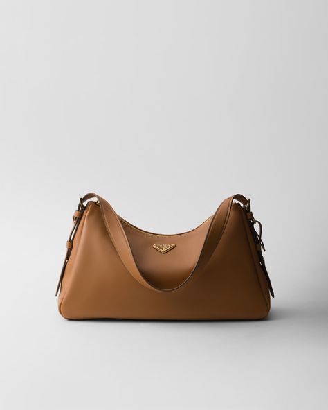 Caramel Prada Aimée Large Leather Shoulder Bag | PRADA Prada Brown Bag, Prada Aimee Bag, Camel Leather Shoulder Bag, Prada Purses, Bag Prada, Prada Shoulder Bag, Luxury Crossbody, Mini Bucket Bags, Fall Winter 2024