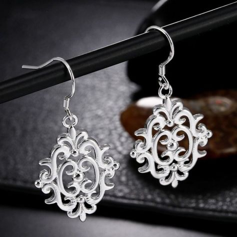 Women's 925 Sterling Silver Elegant Filigree Drop Dangle Vogue Earrings Style : Drop/Dangle Length ( Approx. ) : 4.2cm Width ( Approx. ) : 2.0cm Package Included : Earrings + Free Jewelry Pouch Jewelry Pouch, Fashion Earrings, Jewelry Earrings, 925 Sterling Silver, Pouch, Women Jewelry, Vogue, Sterling Silver, Silver