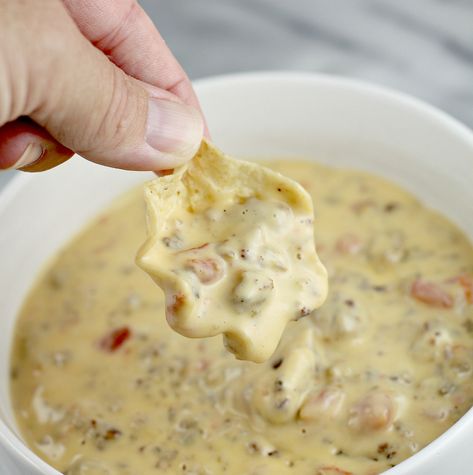 The ultimate crowd-pleasing party dip, my Velveeta Rotel dip recipe has beer, soup, and sausage, that make it THE BEST sausage queso dip. Velveeta Rotel Dip, Dip With Sausage, Rotel Dip With Sausage, Sausage Queso Dip, Velveeta Rotel, Sausage Queso, Velveeta Shells And Cheese, Shells And Cheese, Rotel Recipes