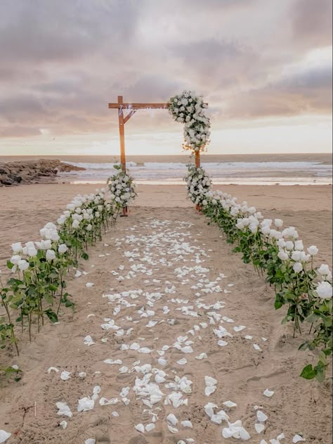 Draped Lights Wedding, Flowers In Sand Proposal, Beach Engagement Decorations, Beach Engagement Decor, Wedding Place Ideas, Beach Proposal Setup, Beach Side Wedding, Bridal Dress Beach Wedding, Beach Wedding Setup