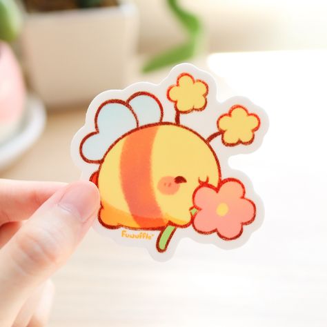 The sweetest fairy bee has a flower for you~ 🐝🌸 The Flower Bee Sticker is now available in my shop! 💛 Check out our latest new arrivals at fuwuffle.com! ✨ #fuwuffle #bee #cutebees #cutebeeart #cute #cuteart #cuteartwork #cuteartstyle #doodle #cutestickers #cuteartist #cutedrawing #cuteaesthetic #stickershop #artbusiness #smallbusiness #stickercollection #stickercollector #stickeraddict #stationery #shopupdate Kawaii Bee, Stickers Journal, Bee Sticker, Classy Tattoos, Sticker Cute, Cute Art Styles, Art Business, Kawaii Art, Sticker Collection