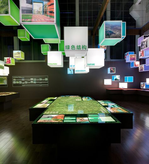 exhibition showcases Montreal's innovative and sustainable urban project, the Complexe Environnemental Saint-Michel Urban Project, Exhibition Display Design, Museum Exhibition Design, Interactive Exhibition, Museum Design, Museum Displays, Exhibit Design, Exhibition Display, Event Exhibition