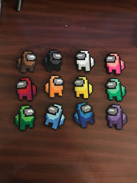 Cute little perler among us characters Among Us Fuse Beads, Among Us Peeler Beads, Pyssla Among Us, Perler Bead Patterns Among Us, Perler Bead Among Us, Perler Cute, Pyssla Ideas Cute, Among Us Perler Beads, Perler Bead Characters