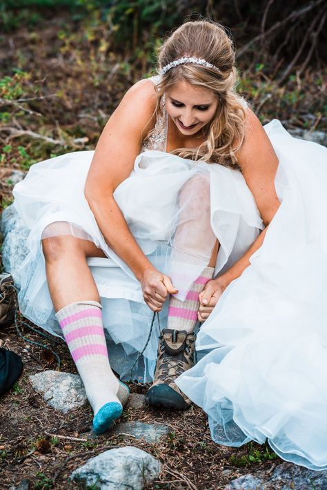 Brides puts on hiking boots to embark on her hiking elopement #adventurebride #mountainbride #adventurewedding #offbeatbride #hikingelopement #elopementattire #elopementgettingready Elopement Shoes Brides, Shenandoah Elopement, On Hiking Boots, Climbing Wedding, Wyoming Elopement, Dead Horse Point State Park, Hiking Elopement, Mountain Bride, Elopement Dress