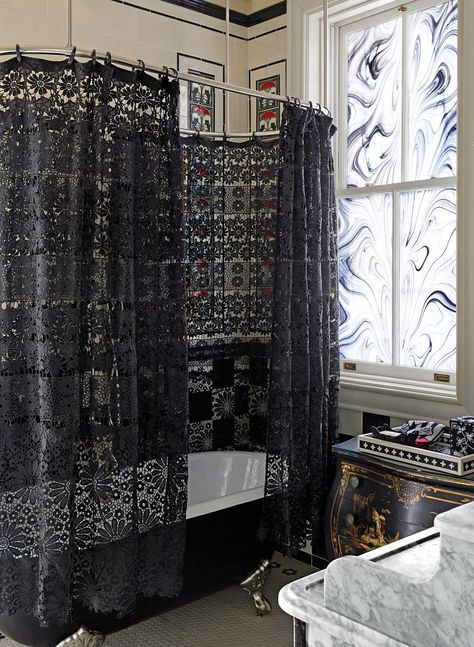 This bathroom's Signature Hardware tub has a lace curtain, adding to the gothic feel of the space. Gothic Bathroom, Dark Home Decor, New York City Apartment, Goth Home, Goth Home Decor, Dark Home, Bath Room, Gothic Home Decor, City Apartment