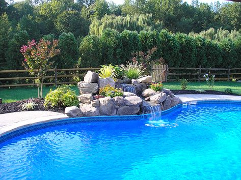 Garden With Swimming Pool, Pool Waterfalls, Waterfall Landscaping, Swimming Pool Fountains, Swimming Pool Waterfall, Stone Water Features, Dream Backyard Pool, Pool Water Features, Pool Fountain