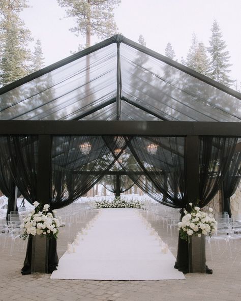 Discover why Hensley Event Resources is California’s leading tenting company! Our stunning black tent, showcased at the Lake Tahoe Ritz Carlton for an unforgettable wedding ceremony, sets the perfect scene. Make your event as iconic as this! #HensleyEventResources #CaliforniaWeddings #LakeTahoeWeddings #EventTenting #event #eventdesign #weddingphotography #glasshouse #weddingplanner #eventplanner #eventdecor #architecture #sanfrancisco #snow #laketahoe #ritzcarlton #blackandwhite Planning... Outdoor Covered Wedding Ceremony, Black Ceremony Arch, Black Wedding Tent, Black Tent Wedding, Black Wedding Aisle, Outdoor Wedding Black, Black Ceremony, Black Gazebo, Gazebo Wedding Ceremony