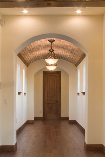 Curved Ceiling Hallway, Barrel Vault Ceiling Hallway, Barrel Ceiling Hallway, Brick Barrel Ceiling, Barrel Ceiling Foyer, Brick Ceiling Ideas, Barrel Ceiling Ideas, Rounded Ceiling, Brick Ceiling