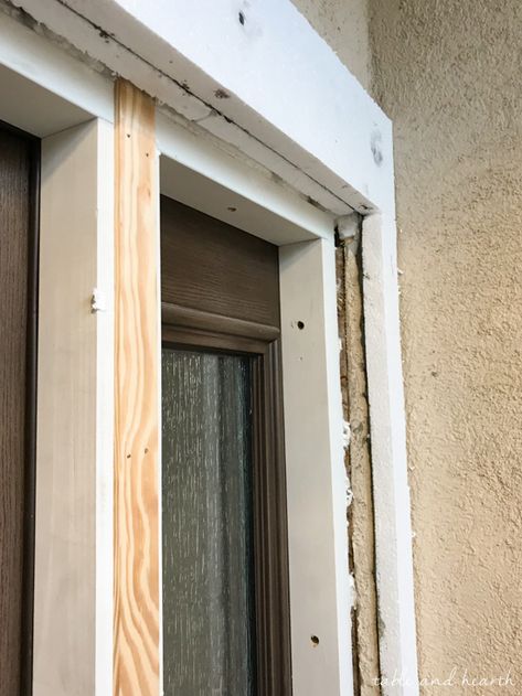 Installing a new entry door unit on a stucco home can be a daunting project. See how it went for this blogger's crew as they installed a beautiful new unit on a mid-90s stucco home! #thermatrudoors #entrydoor #wooddoor #fiberglassdoor www.tableandhearth.com Exterior Door Frame, Exterior Door Trim, Cement House, Stucco Repair, Decorative Wood Trim, Replacing Front Door, Stucco Siding, Door Frame Molding, French Doors Exterior