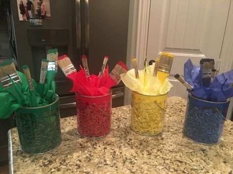 Art Theme Centerpieces Party Ideas, Art Center Piece Ideas, Paint Bucket Centerpiece, School Event Centerpieces, Masterpiece Classroom Theme, Paint Brush Centerpiece, Paint Party Centerpieces, Teacher Luncheon Centerpieces, School Supply Centerpiece