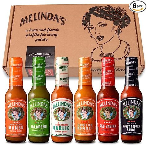 Melinda’s Chef Fig’s Heat & Flavor Collection - Gourmet Hot Sauce Gift Set with a Variety of Flavors & Spice Levels - Includes Ghost, Mango, Garlic, Red Savina, Scotch Bonnet, Jalapeño - 5 oz, 6 Pack Fermented Hot Sauce Recipe, Business Gift Ideas, Hot Sauce Packaging, Gift Ideas For Anyone, Types Of Sauces, Spices Packaging, Habanero Hot Sauce, Hot Sauce Recipes, Ghost Peppers