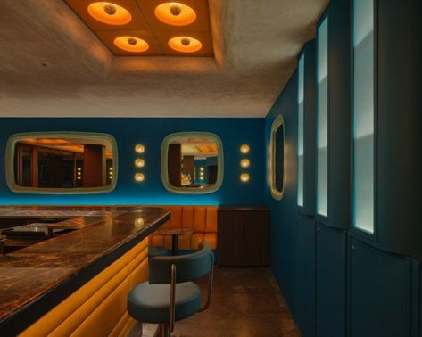 taste space's bangkok bar is a fusion of 60s cinema aesthetics 60s Cinema, Futuristic Bar, Bangkok Bar, Retro Futuristic Interior, Cinema Architecture, Retro Interior Design, Futuristic Aesthetic, Futuristic Interior, Retro Interior