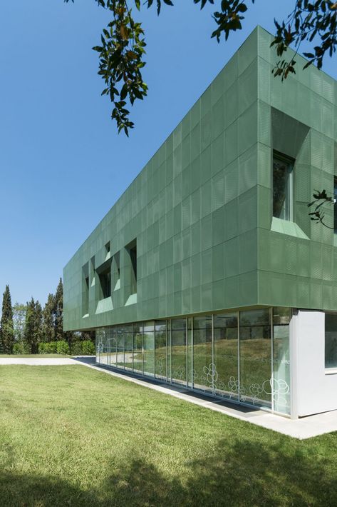 This mental health facility creates calm with a perforated green facade - Archpaper.com Metal Panels Facade, Office Facade, Perforated Metal Panel, San Miniato, Commercial And Office Architecture, Metal Facade, Green Facade, Building Elevation, Metal Cladding