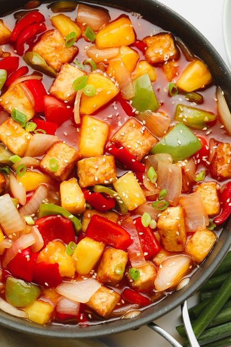 This better-than-takeout Sweet and Sour Tofu is so easy to make at home. Perfect fried tofu, pineapple, and veggies are tossed together in a homemade sweet and sour sauce and ready to eat in under 30 minutes. It’s a delicious weeknight dinner or a perfect solution when you’re craving takeout! Tofu Pineapple, Sweet And Sour Vegetables, Homemade Sweet And Sour Sauce, Sweet And Sour Tofu, Deep Fried Tofu, Tofu Soup, Asian Stir Fry, Plant Based Diet Recipes, Tofu Dishes