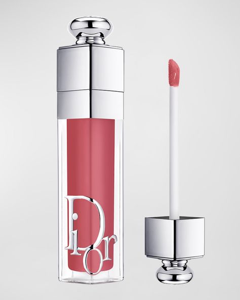 Dior Dior Addict Lip Maximizer Gloss What It Is  The iconic Dior Addict Lip Maximizer plumping lip gloss gets a refresh with a new 90% natural-origin formula, a reimagined case, and updated shades.  What It Does  Composed of 90% natural-origin ingredients and infused with cherry oil and hyaluronic acid, this Dior plumping lip gloss smooths and makes lips look bigger, leaving them hydrated for up to 24h. Now available in a new range of shiny shades with clear, intense, shimmerin...