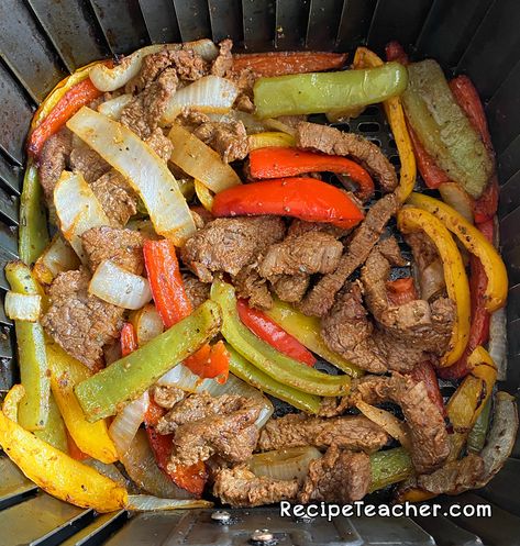 Marinated steak, onion and bell peppers, cooked to perfection in an air fryer to make amazing air fryer steak fajitas. Air Fryer Steak And Peppers, Steak Fajita Air Fryer, Steak Fajitas In Air Fryer, Air Fryer Steak Fajitas Recipes, Air Fryer Pepper Steak, Steak Fajitas Air Fryer, Beef Fajitas In Air Fryer, Air Fryer Beef Fajitas, Air Fryer Fajita Steak