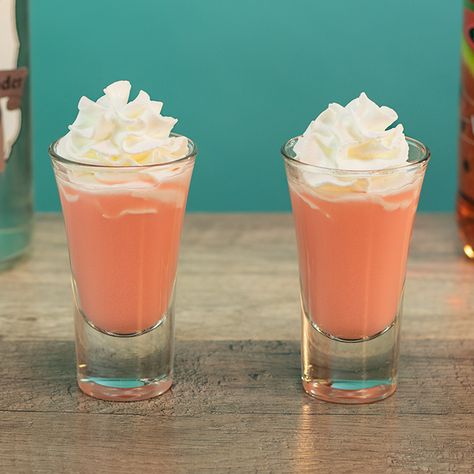 Shot & Shooter Recipes For Any Occasion | Tipsy Bartender Pink Scooby Snack Drink, Ice Cream Shots Alcohol, Watermelon Pucker Drinks, Scooby Snack Drink Recipe, Shots With Whipped Cream, Scooby Snack Drink, Rum Watermelon, Scooby Snack Cocktail, Scooby Snack Shot