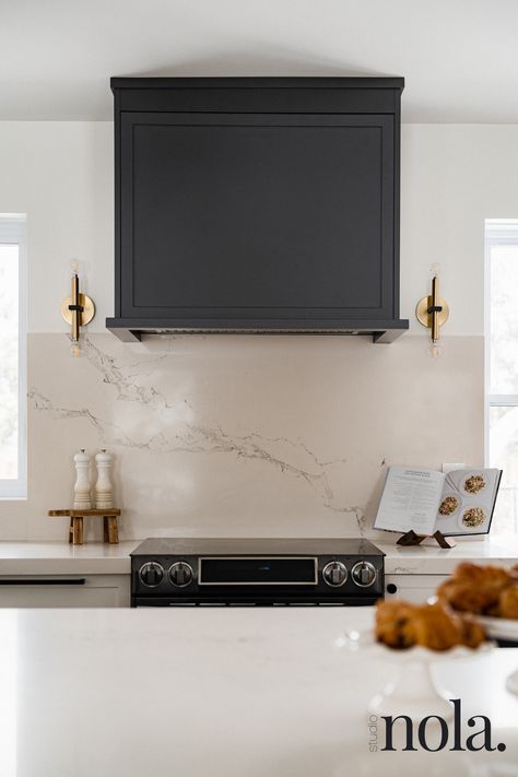 Custom hood with gold sconces Designed by: Studio Nola. Photographed by: Dan Aponte Kitchen Sconces, Full House Renovation, Gold Sconces, Black Curves, Modern Farmhouse Design, Vent Hood, Kitchen Inspiration Design, House Renovation, Full House