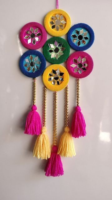 Diwali Decoration Wall Hanging, Wall Hanging With Wool, Craft Hanging Decorations, Wall Hanging With Bangles, Toran Making Ideas For Diwali, Wool Crafts Diy Decoration, Craft With Bangles, Kankotri Lekhan, Fabric Decoration Ideas