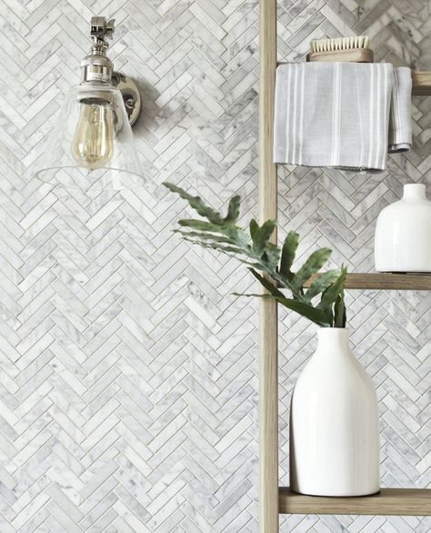 A fan of intricate tiling? These tiles look fantastic when laid herringbone style, as the colour variation in the marble adds a decorative aspect. #bathroom #tiles #herringbonetiles #realhomes Herringbone Tile Wall, Marble Herringbone Tile, Hexagon Marble Tile, Herringbone Tiles, Herringbone Tile Floors, Marble Herringbone, Carrara Marble Tile, Vibeke Design, Cheap Bathrooms