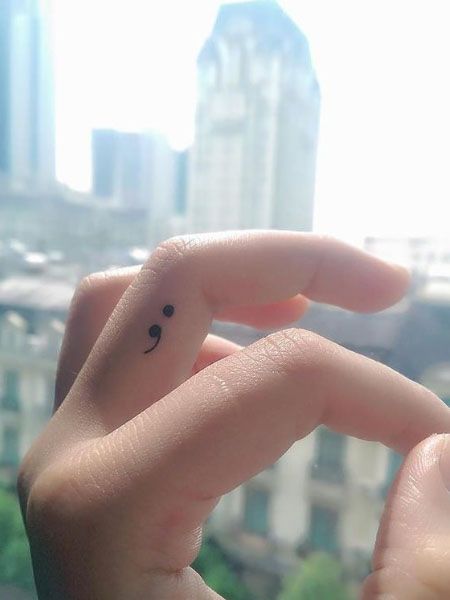 Semicolon Tattoo Meaning & Designs To Inspire You - The Trend Spotter Unique Semicolon, Semicolon Tattoo Meaning, Colon Tattoo, Tato Henna, Tattoo Trend, Wild Tattoo, Semicolon Tattoo, Small Tattoos Simple, Aesthetic Tattoos