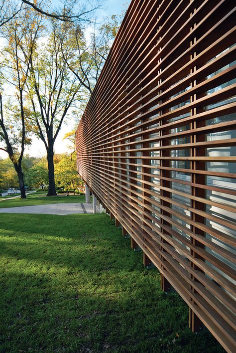 Modern facade with slatted Cumaru wood screen, Dan Rockhill, Lawrence, Kansas Screen Architecture, Architecture Facade, Wood Facade, Timber Screens, Wood Screens, Wood Architecture, Metal Siding, Modern Architecture House, Exterior Wood