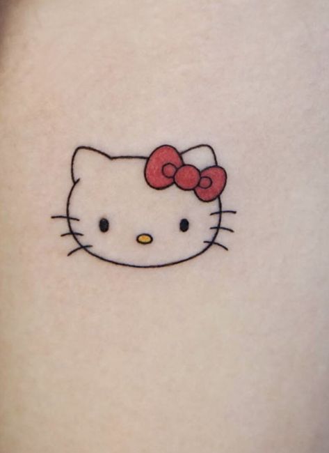 Mini Tattoos Hello Kitty, Small Tattoos Hello Kitty, Fine Line Hello Kitty Tattoo, Tiny Hello Kitty Tattoo, Hello Kitty Tattoo Design, Tatuajes Hello Kitty Tattoos, Tatuaje Hello Kitty, Night Bike Ride Video, Hello Kitty Tattoo