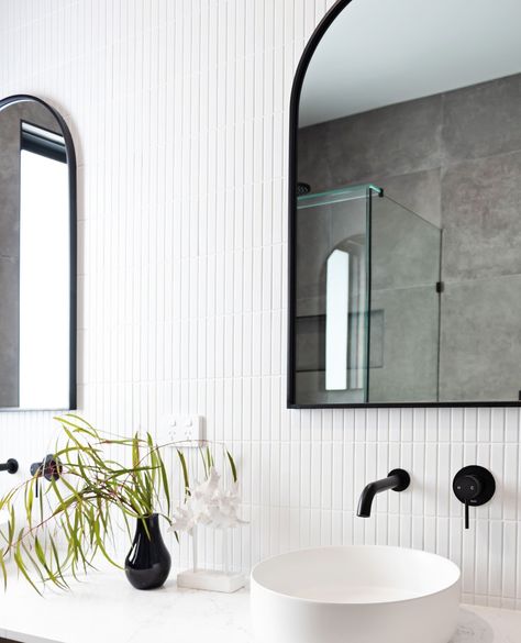 Who says monochrome can't be cozy? 🤍 Sunlight streaming through and lush greenery bring this sleek space to life, while the white kitkat tiles allow our matte black fixtures to pop!⁠ 📸: @cookandbathe⁠ 👷‍♂️⁠: @true_north_construction⁠ ⁠ ⁠ #bathroom #bathroomdesign #interiordesign #design #interior #home #homedecor #bathroomdecor #shower #bath #renovation #homedesign #bathroomremodel #bathroominspo #bathroominspiration #bathroomrenovation #tiles #toilet #renovationideas #luxury #marble #bathroo... White Kitkat Tiles Bathroom, White Kitkat Tiles, Kitkat Tiles, Matte Black Fixtures, Tiles Toilet, Black Fixtures, Bath Renovation, Luxury Marble, Bathroom Goals