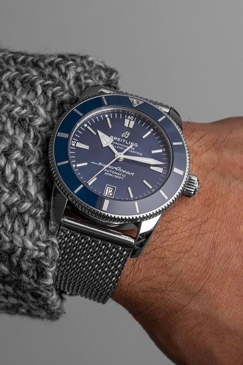 The Superocean Heritage II B20 Automatic 42 (Ref. AB2010161C1A1) is one of Breitling's most popular diving watches and powered by the B20 automatic movement. This model features a 42 mm stainless steel case and durable bracelet in the "Ocean Classic" design. With a blue bezel, blue dial and a date window at 6 o'clock, this diving watch with a water resistance up to 200 metres is a true everyday hero. Breitling Watches Mens, Breitling Superocean Heritage, Diving Watch, Breitling Superocean, Breitling Watches, Everyday Heroes, In The Ocean, Dive Watches, O Clock