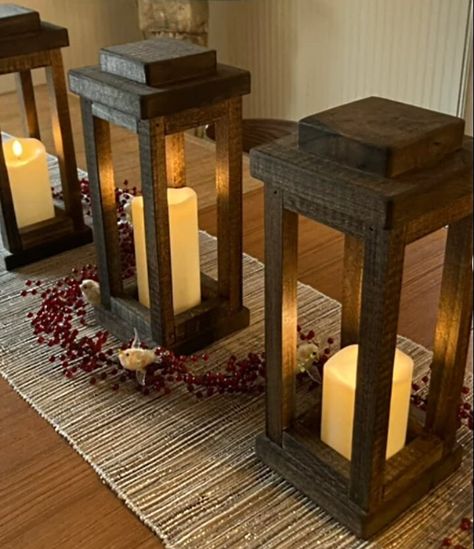 Free shipping. Decorative Wood Wooden Wedding Lanterns Centerpiece bulk set of 10. Rustic yet beautiful, these lanterns are the perfect centerpiece for wedding reception tables.  Wooden Lanterns are often used as wedding reception decor when a rustic or farmhouse setting is desired. These lanterns are not only beautiful but are also built to last, and can be used season after season. They pair perfectly with wooden light fixtures or chandeliers. The lanterns in the pictures are 13 1/4 inch and are stained Provincial (our most popular color). Made in the USA by an experienced woodcrafter. These lanterns are made with real, solid wood, which often includes knots or other imperfections, which add a rustic beauty, character and individuality to the items. Dimensions: choose from -13 1/4 x 5 1/ Manly Centerpieces, Wood Candle Lantern Centerpieces, Candle Latern, Wedding Centerpieces Wood Lantern, Wood Lantern Wedding, Outdoor Candle Lanterns Wood, Wood Lantern Centerpiece, Wood Lantern Diy, Rustic Wood Lanterns Candle Holders