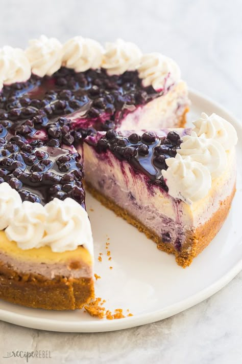 This Blueberry Cheesecake is ultra creamy and swirled with fresh blueberry sauce. It's baked to perfection with no water bath and no fuss! #cheesecake #blueberry #blueberries #dessert #recipe Homemade Cheesecake Recipes, Cheesecake Caramel, Blueberry Cheesecake Bars, Individual Cheesecakes, Blueberry Cheesecake Recipe, Lemon Blueberry Cheesecake, Lemon Cheesecake Bars, Homemade Cheesecake, Blueberry Sauce