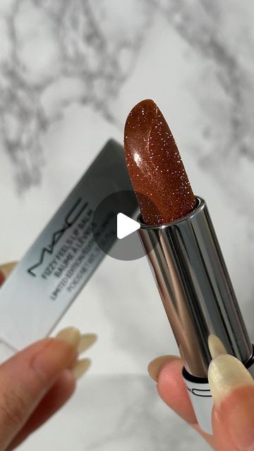 Poppy Locks on Instagram: "It’s SPARKLE szn 🤩✨

So @maccosmeticsuk brought back their iconic fizzy feels lip balm, which was a complete sellout last year and for good reason 😏 How can you resist? Will you be picking this up?

✨ Shade - Taste for bubbles 

✨ Available at all tagged 

#maccosmetics #maccosmeticsuk #macholiday #macbizarreblizzard #shimmer #glitterlipgloss #glitterlips #shimmerlipgloss #newmakeup #macromakeup #viralmakeup #giftsforher #lipbalm #lipbalmaddict #lipstick #lipstickjunkie #holidaymakeup #christmasmakeup #makeupmusthaves #prettymakeup #partymakeup #tasteforbubbles" Mac Glitter Lipstick, Shimmer Lipstick, Shimmer Lip Gloss, Glitter Lip Gloss, Glitter Lips, Christmas Makeup, Makeup Must Haves, Holiday Makeup, Party Makeup