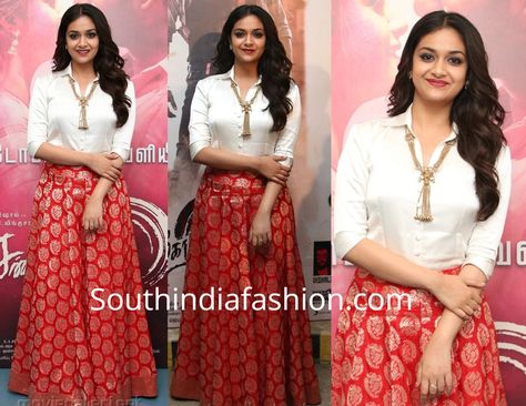 Keerthy Suresh at Sandakozhi 2 Pre Release Event Banarasi Skirt With Shirt, Shirt And Skirt Indian, Banarasi Skirt And Top, Skirt Shirt Indian Outfit, Red Skirt Outfit Indian, White Shirt And Long Skirt Outfit, Shirt And Long Skirt Outfit, White Shirt With Skirt, Long Skirt With Shirt