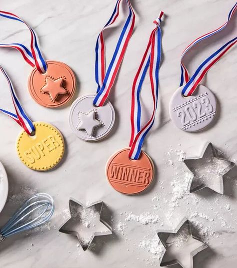 How To Make Award Medal Cookies Online | JOANN Diy Awards, Award Medal, Party Games Ideas, Summer Outdoor Decor, Discounts For Teachers, Award Ideas, Patriotic Fabric, Holiday Party Games, Turkey Trot