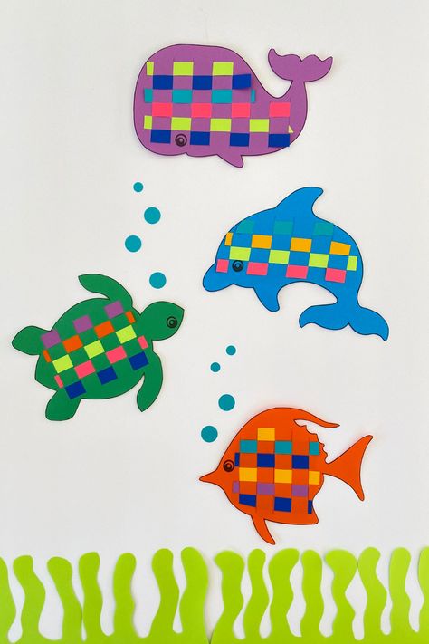 This sea creature craft is sure to make waves. This kid-friendly weaving activity is perfect for the home or classroom. To make, cut strips of Astrobrights Paper. Then print out the free sea creatures template. Cut along the lines, and have students weave the paper through the lines. *Difficulty level: Easy* Sea Creature Craft, Simple Paper Crafts For Kids, Sea Creatures Crafts, Simple Paper Crafts, Origami Paper Flowers, Weaving Patterns Design, Weaving For Kids, Kid Friendly Crafts, Ocean Kids