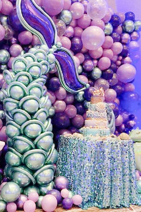 Mermaid birthdays are always a popular theme with girls and a Sweet 16 is no different. Just imagine how much sophistication you can bring to the party with beautiful decor and party food. See more party ideas and share more at CatchMyParty.com Mermaid Tail Balloon Column, Mermaid Theme Balloon Decor, Mermaid Tail Balloon Garland, Balloon Mermaid Tail, Mermaid Balloon Decor, Mermaid Balloon Column, Mermaid Party Balloons, Unique Balloon Ideas, Little Mermaid Balloon Garland