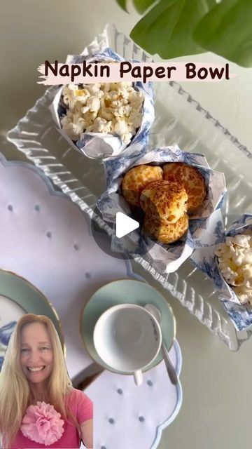 Thousands of Tips on Instagram: "Learn how to prepare cute napkin snack holders with Krica Costa to serve at your party. This is a quick and easy way to transform a napkin into a beautiful, elegant centerpiece. All you need is a napkin and a cup. Take a decorated napkin and fold the 4 tips to the center then repeat the process folding 4 tips again. Flip it over and fold  4 tips to the center once again. 

Next, take a cup and place it in the center of the folded napkin. Lift the napkin up and over the cup. Carefully open the first and second layers of the folds and is ready your napkin little paper bow

Credits:@kricacosta

#NapkinFolding #CenterpieceIdeas #TableSetting #EasyDIY #CraftIdeas #HomeDecor #PartyDecor #HostingTips #DIYHomeDecor #CreativeMoms #CreativeDads #CraftWithMe #LearnNew Snack Holders, Elegant Centerpiece, Paper Bow, Charcuterie Recipes, Paper Bowls, Elegant Centerpieces, Napkin Folding, Paper Folding, Food Gifts