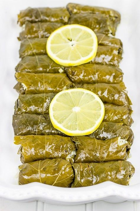 Filled with the flavors of lemon, dill and parsley, these Stuffed Grape Leaves are a fun way to enjoy classic Greek food at home! #EveryDayCare Grape Leaves Recipe, Greek Spinach Pie, Homemade Tzatziki Sauce, Stuffed Grape Leaves, Homemade Tzatziki, Greek Lemon Chicken, Lemon Dill, Food At Home, Greek Dishes