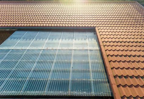 Residential House with Tin Roof and Transparent Corrugated Sheets As Terrace Roofing Stock Image - Image of corrugated, transparent: 141768115 House With Tin Roof, Transparent Roof, Corrugated Sheets, Service Area, Building Roof, Tin Roof, Roof Panels, Residential House, Roof Solar Panel